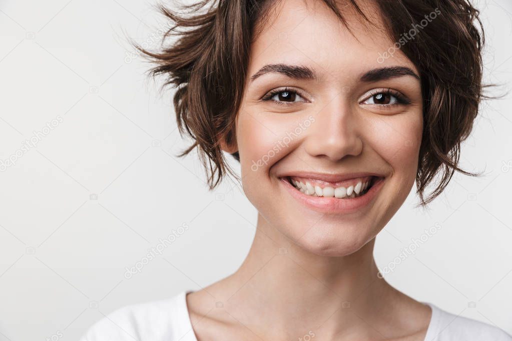 Portrait closeup of pretty woman with short brown hair in basic 