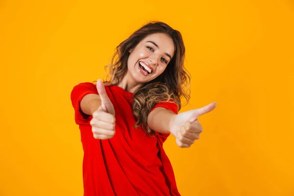 Portrait of a lovely cheerful young woman standing — Stock Photo, Image