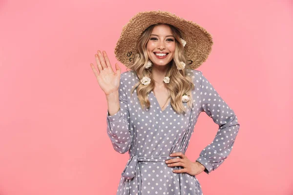 Beautiful young blonde woman wearing summer hat — Stock Photo, Image