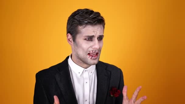 Angry Upset Dead Bridegroom Halloween Makeup Looking Orange Background — Stock Video