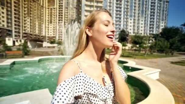 Cheerful Blondy Woman Dress Making Selfie Gesturing While Standing Fountain — Stock Video