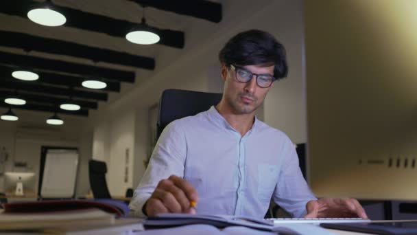 Serious Employee Man Eyeglasses Using Computer Writing Something While Sitting — Stock Video