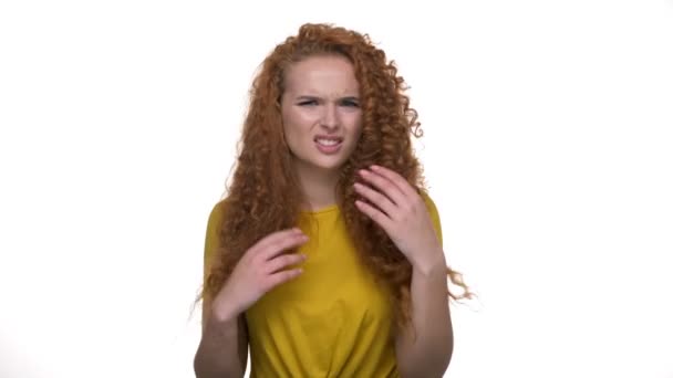 Confused Young Redhead Curly Woman Disagreeing Something Gesturing Hands While — Stock Video