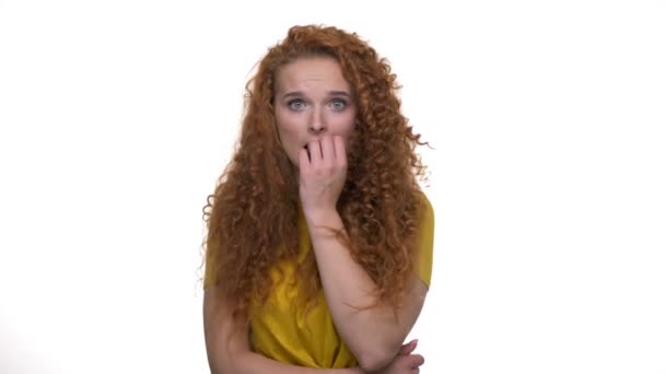 Cute Young Redhead Curly Lady Feeling Scared While Looking Camera — Stock Video