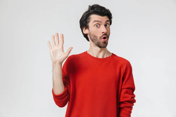 Homem posando isolado sobre fundo da parede branca . — Fotografia de Stock