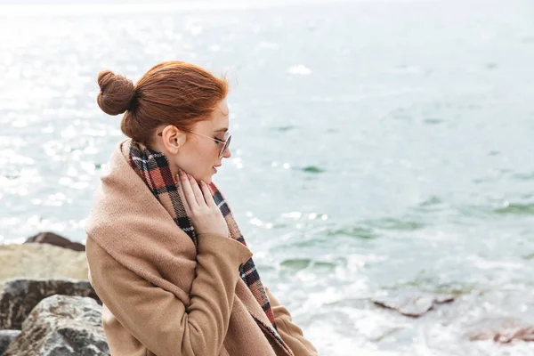 Lovely young redhead woman wearing autumn coat — Stock Photo, Image