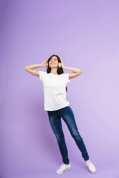 Full length portrait of a cheerful casual woman — Stock Photo, Image