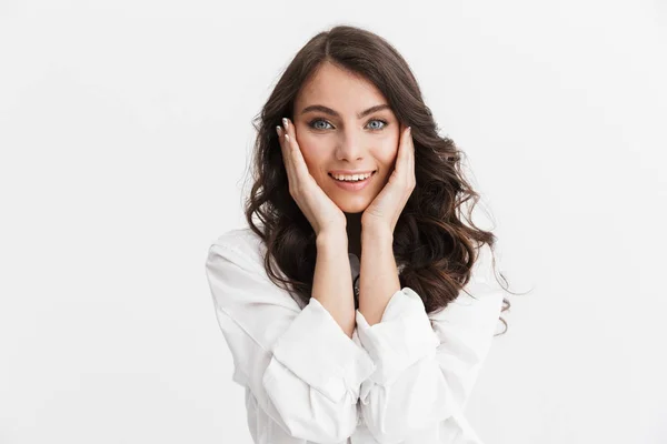 Beautiful young woman with long curly brunette hair — Stock Photo, Image