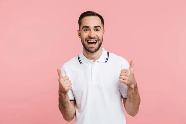 Portrait of an excited bearded man standing