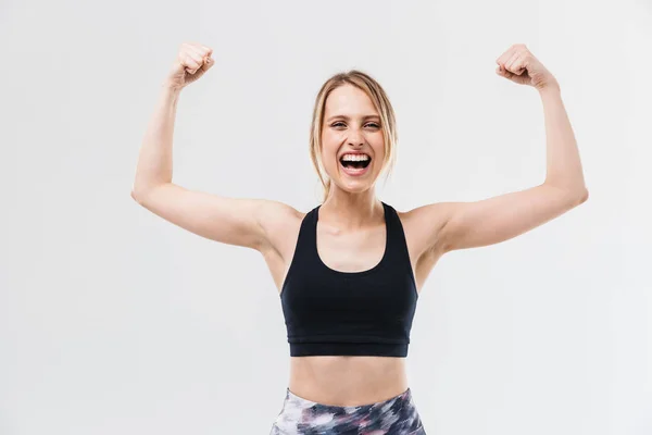 Image of excited blond woman 20s dressed in sportswear working o — Stock Photo, Image