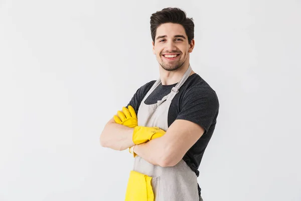 Happy young houseman househusband isolated over white wall background. — Stock Photo, Image