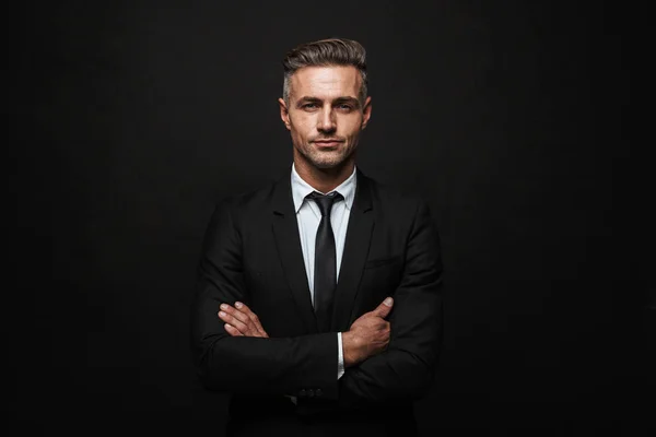 Handsome confident businessman wearing suit — Stock Photo, Image