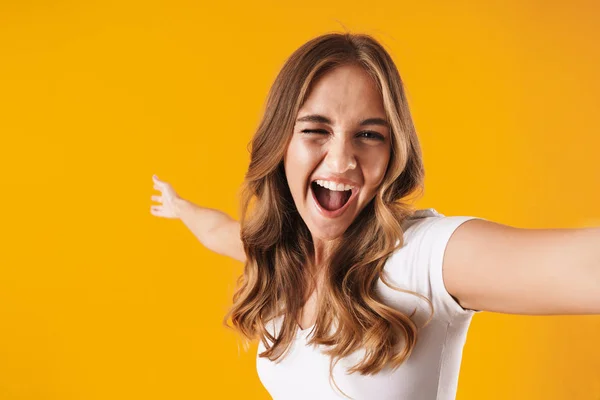 Excited young girl wearing casual clothes standing — Stock Photo, Image