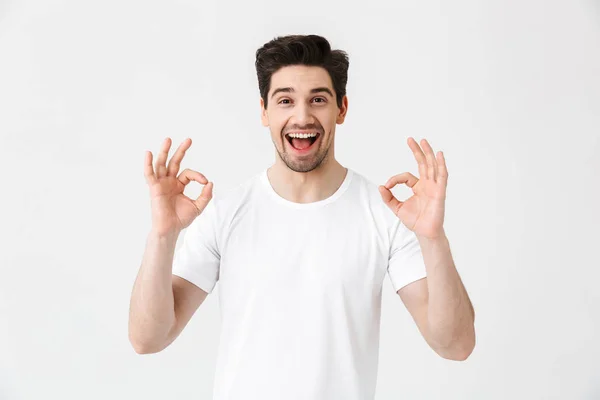 Full length portrait of a cheerful young man — Stock Photo, Image