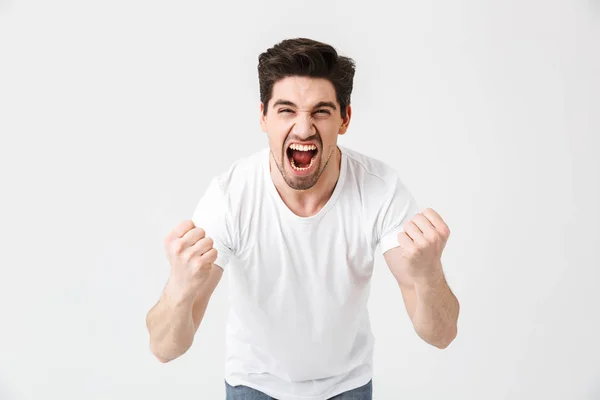 Excited happy young man posing isolated over white wall background. — Stock Photo, Image