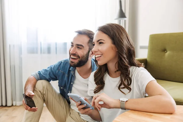 Beautiful young couple in love at home — Stock Photo, Image