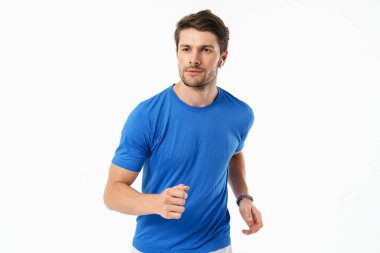 Rahat t-shirt gülümseyen ve runn yakışıklı adam Fotoğraf closeup