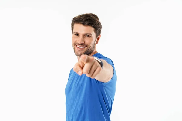 Attractive young fit sportsman wearing t-shirt standing — Stock Photo, Image