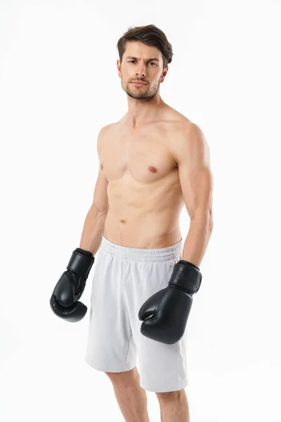 Handsome young fit shirtless sportsman standing — Stock Photo, Image