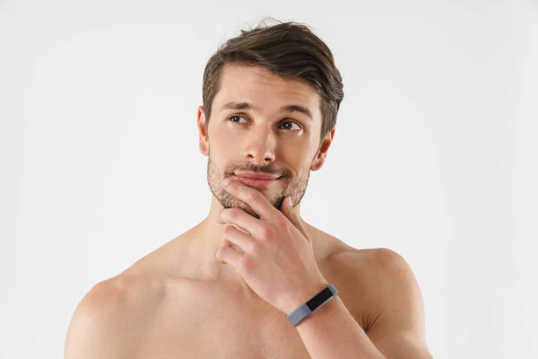 Close-up de um belo jovem homem sem camisa isolado — Fotografia de Stock