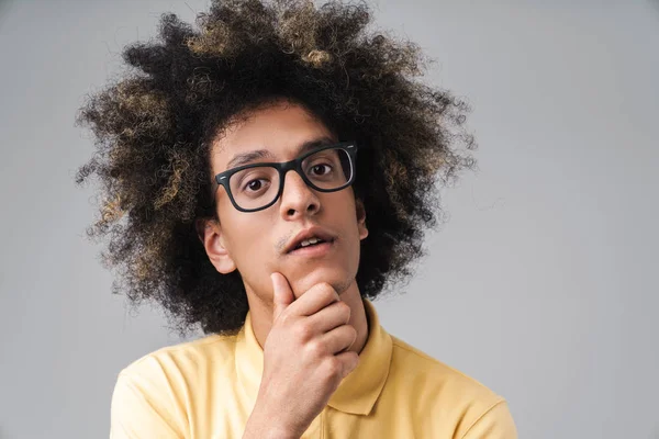 Photo of thoughtful caucasian man with afro hairstyle wearing ey — Stock Photo, Image