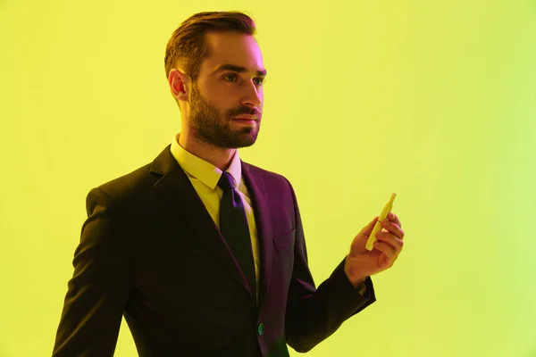 Handsome young businessman wearing formal suit — Stock Photo, Image