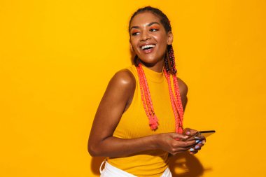 Image of alluring african american woman with afro braids smilin