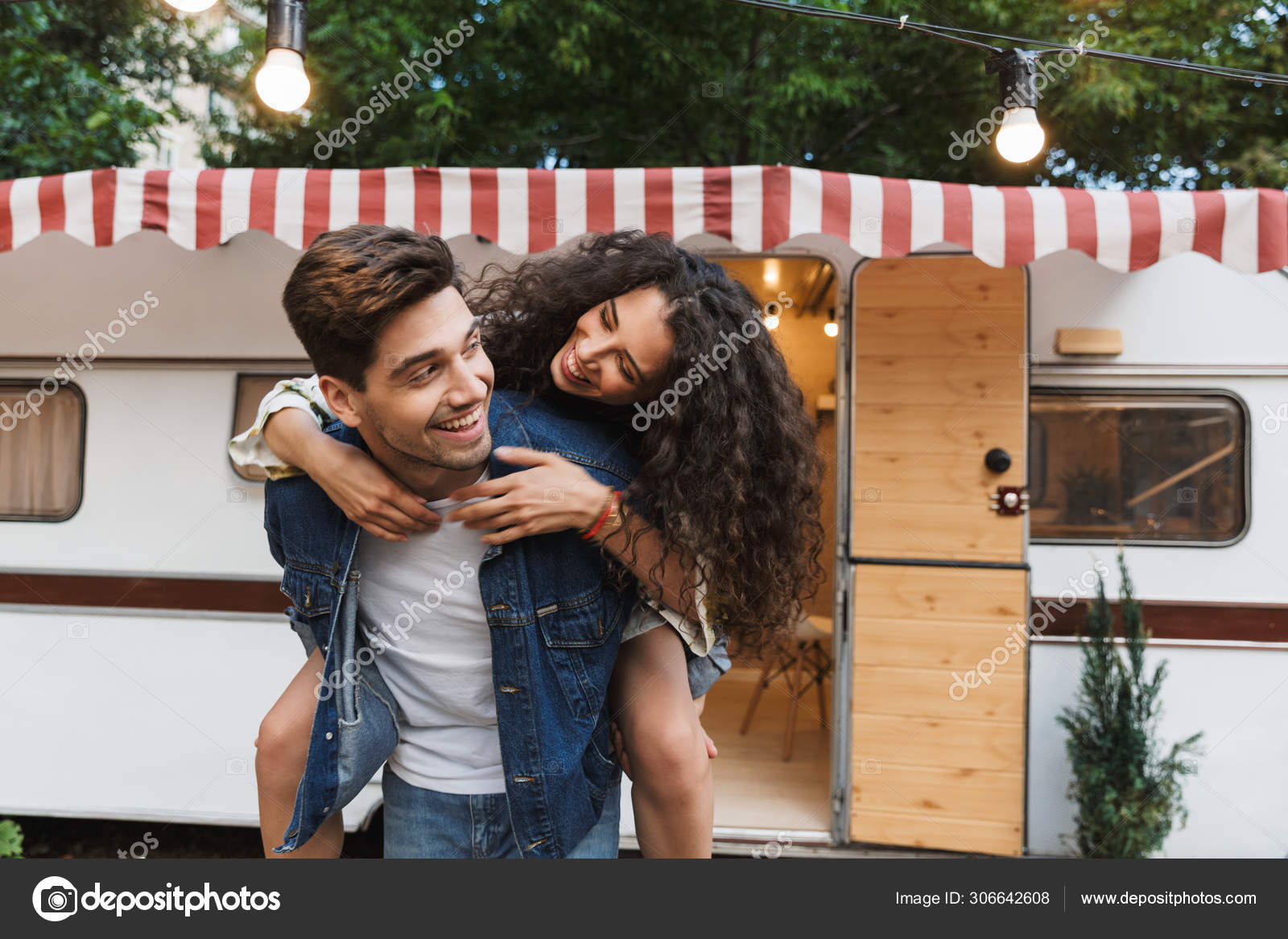 Midadult Caucasian Woman Giving Man Piggyback Stock Photo 3194063