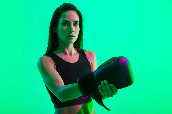 Beautiful young fitness girl standing isolated over background — Stock Photo, Image