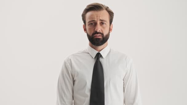 Displeased Young Bearded Business Man Becoming Shocked Touching His Face — 图库视频影像
