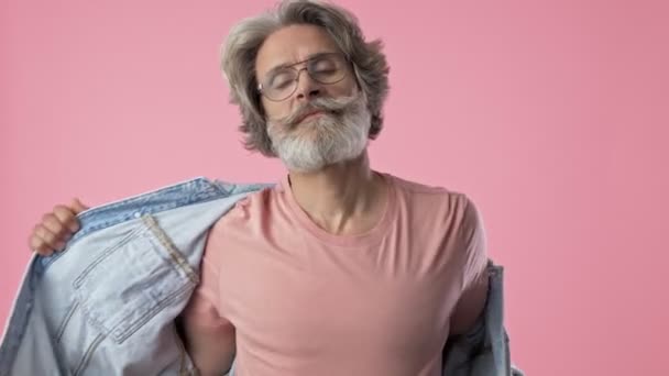 Confident Elderly Stylish Bearded Man Gray Hair Taking His Denim — Stock Video