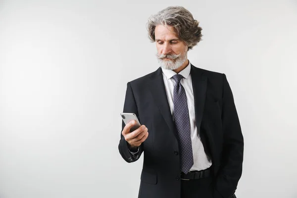 Smiling confident mature businessman wearing suit — Stock Photo, Image