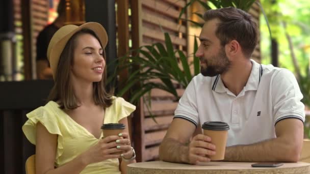 Beautiful Pleased Young Lovely Couple Talking Drinking Coffee While Sitting — Stock Video