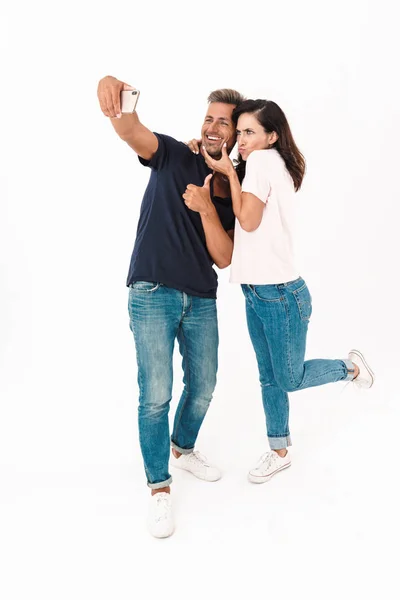 Full length of a cheerful attractive couple — Stock Photo, Image
