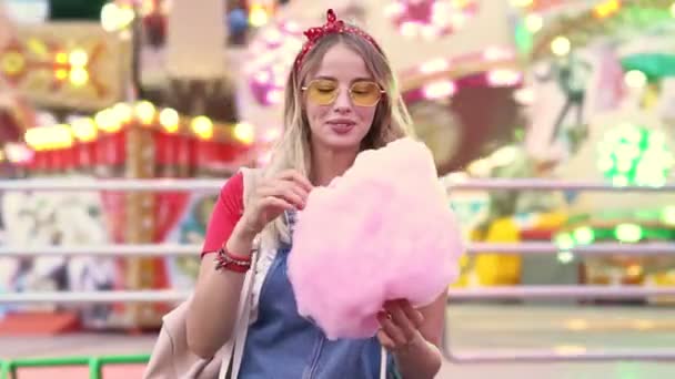 Excited Young Blonde Woman Laughing Enjoying Eating Candy Floss While — Stock Video