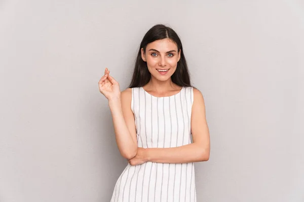 Image of beautiful brunette woman wearing dress smiling and posi — 스톡 사진