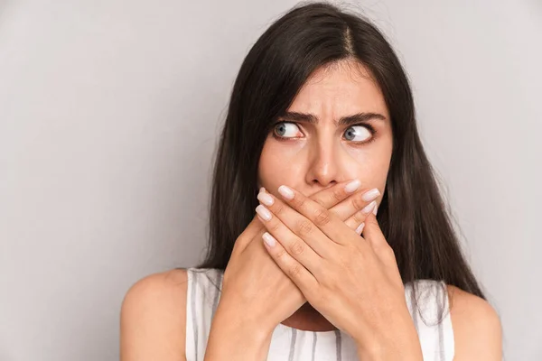 Image closeup of terrified woman with long dark hair covering he — Stock Photo, Image