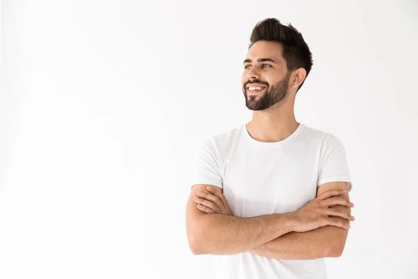 Imagen de un joven atractivo sonriendo y mirando a un lado al copyspace —  Fotos de Stock