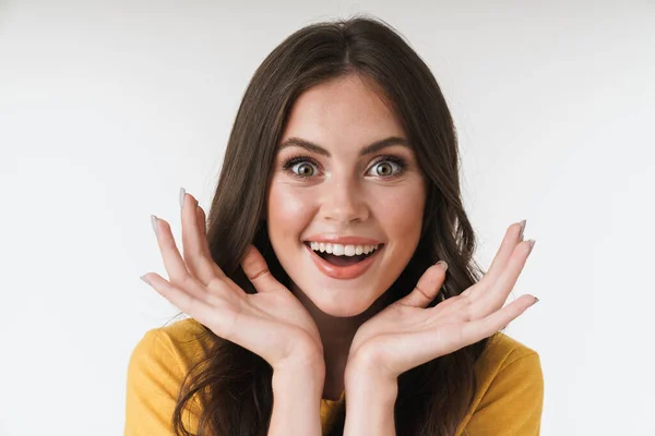 Image of amazed brunette woman wearing casual t-shirt smiling an — Stock Photo, Image