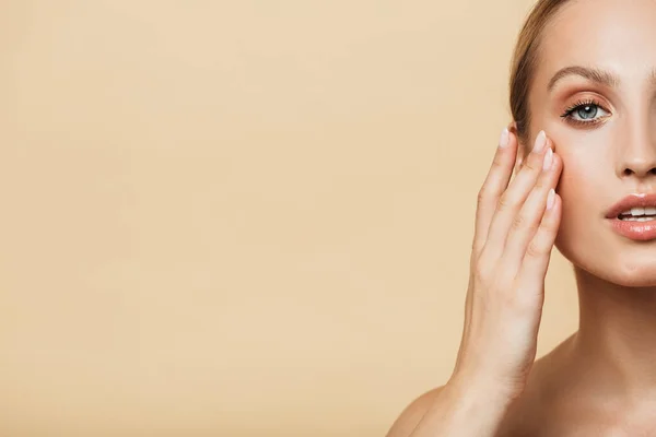 Cropped image of beautiful half-naked woman touching her face — Stock Photo, Image