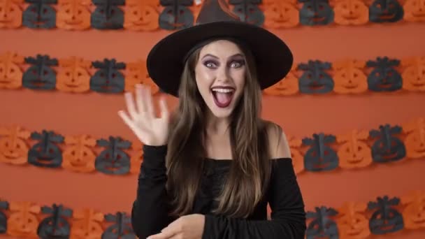 Beautiful Happy Young Witch Woman Black Halloween Costume Smiling Waving — Stock Video