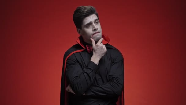 Mystic Vampire Man Blood Fangs Black Halloween Costume Thinking Something — Stock Video