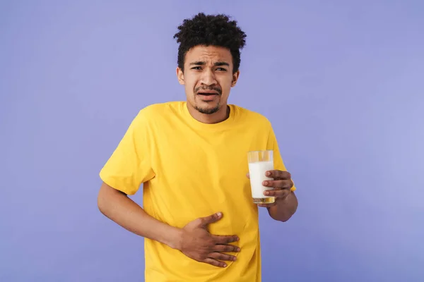 Photo Unhappy African American Man Stomachache Holding Glass Milk Isolated — Stock Photo, Image