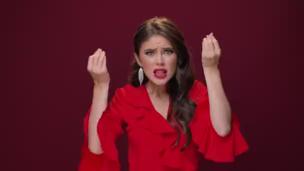 Emotional Angry Young Woman Wearing Red Dress Swears While Raised — Stock Video