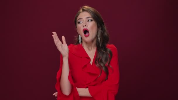 Bored Woman Wearing Red Dress Yawning While Looking Camera Isolated — Stock Video