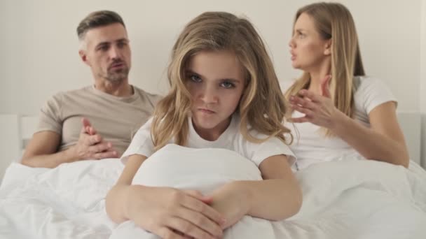 Serious Young Parents Scolding Little Daughter Bedroom Home — Stock Video