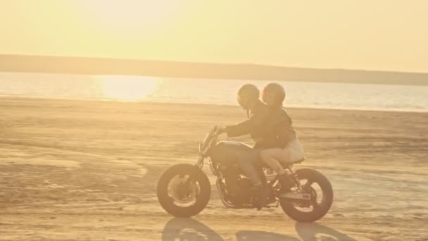 Confident Young Couple Man Woman Riding Motorbike Together Beach Sunset — Stock Video