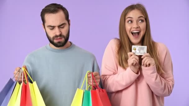 Cheerful Blonde Woman Holding Credit Card Enjoying Moment While Standing — Stock Video