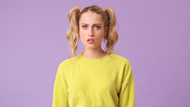 Lovely European Girl Yellow Sweater Crosses Her Arms Turns Offended — Stock Video