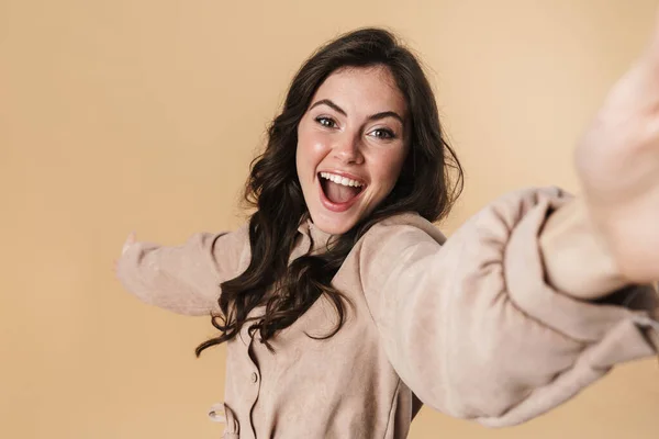 Image Cheerful Cute Woman Laughing Taking Selfie Photo Isolated Beige — Stock Photo, Image